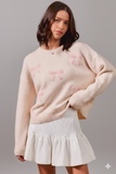 Elegant Ribbon‑Embroidered Round Neck Sweater – Soft, Feminine & Cozy