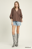 Chic Texture Statement Blouse with Notched Detail & Dramatic Balloon Sleeves